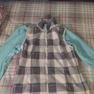 this vest with a teal shirt